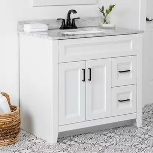 Sleek White Vanity with Black Handles